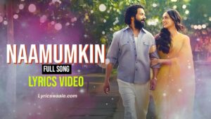 Naamumkin Lyrics in Hindi,Naamumkin Hindi song poster featuring Maalik and female lead walking hand in hand – Lyricswaale.com